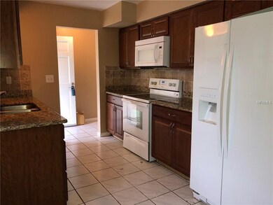 WOOD CABINETS AND REAL GRANITE
