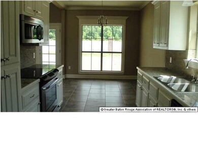 all electric appliances; breakfast area in rear or