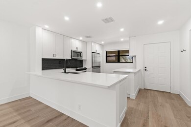 12910 Briarlake Dr unit C201, West Palm Beach, FL 33418 - photo 2