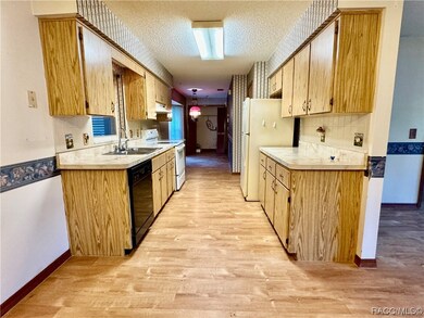 FROM DINING ROOM, KITCHEN, EATIN NOOK, LAUNDRY CLO
