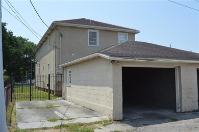 Includes (1) car garage + 1 parking pad & fenced i