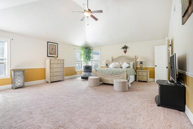 Upstairs, retreat to the Massive Primary Suite with Vaulted Ceilings and plenty of space for a Sitting Area