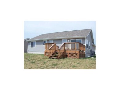 Exterior Back. Rear view with deck