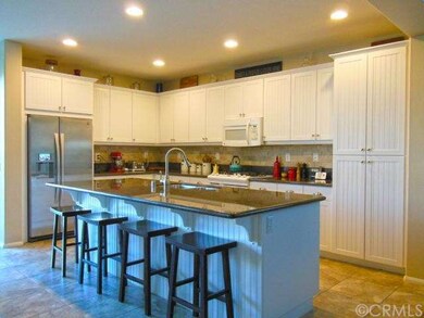 Large kitchen with island, breakfast bar, lots of 