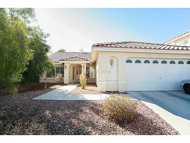 Facade/Exterior Front. 8027 Avalon Island St, Las