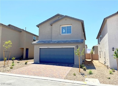 Traditional home with an attached garage, stucco s