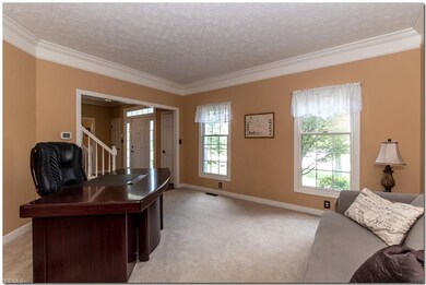Formal Living Room with Crown Moldings