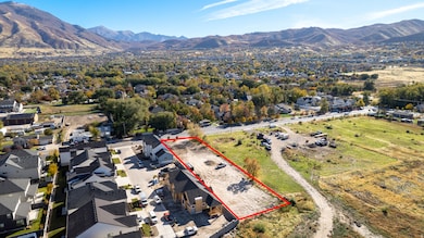 View of property location featuring a mountainous background and property parcel outlined