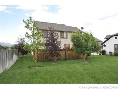 Exterior Back. Fenced private patio and