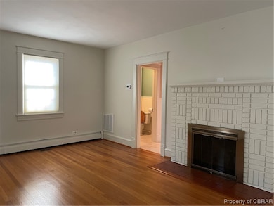 Stone surround at Fireplace