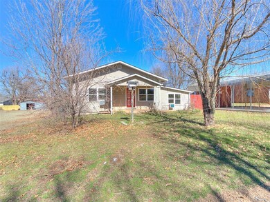 View of front of house featuring a front lawn