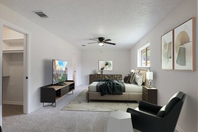 Virtually staged, primary bedroom showcasing the e