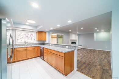 Overlooks fireplace and backyard