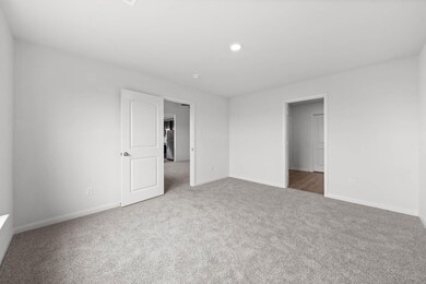 Unfurnished bedroom featuring carpet
