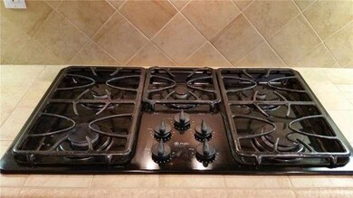 The stunning gourmet kitchen comes complete with a