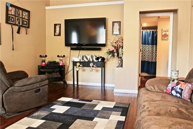 Great Room with plant shelf & view of 2nd full bat