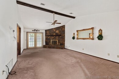 Alternate view of the living room and firelplace