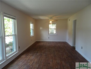 View of living room from entrance.  Vinyl plank fl