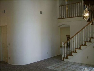 View from Living Room toward Family Room and Stair