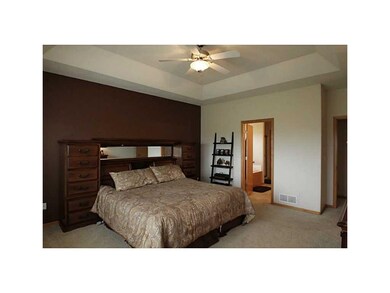 . Spacious master bedroom with tray ceilings.
