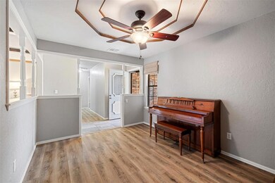 Miscellaneous room with light hardwood / wood-styl