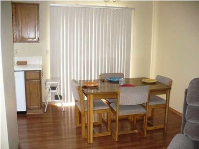 KITCHEN/DINING ROOM WITH NEW WOOD LAMINATE FLOORS
