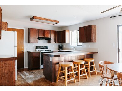 Gas range & bar seating in the kitchen