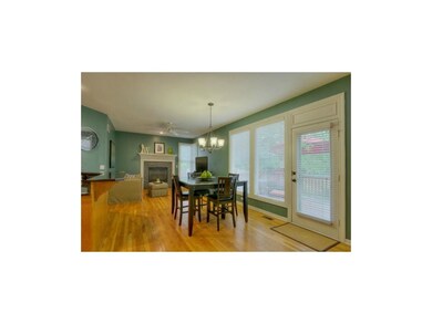 Breakfast nook opens to hearth room with updated f