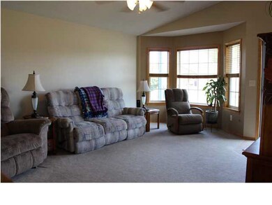 Vaulted ceilings make living room bright and open!