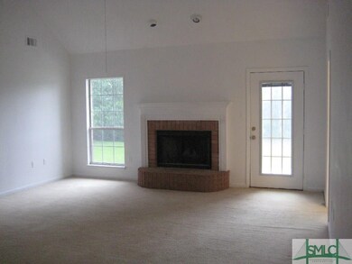Large family room with plenty of light and view of