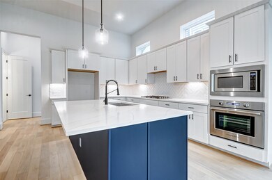 613 W 27th St, Houston, TX 77008 - photo 7