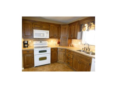 Solid surface countertops, new tile backsplash, un