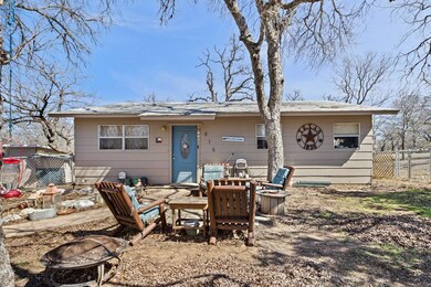 View of front facade featuring a patio, an outdoo
