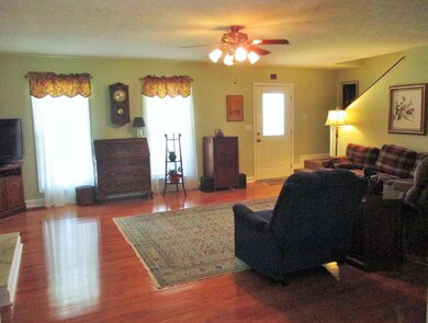 This living room view helps to see just how large it is at 18x21 and how nicely this floor plan flows. 