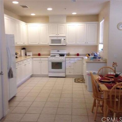 Bright and Cheery kitchen with distinctive, corian