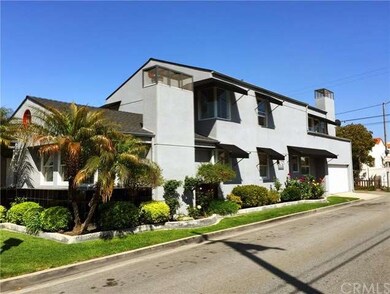 Corner lot home in Belmont Shore with garage acces