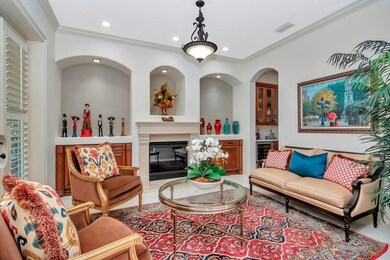 formal living room with gas fire place