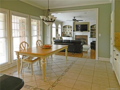 Naturally Bright Kitchen Opens into Family Room.