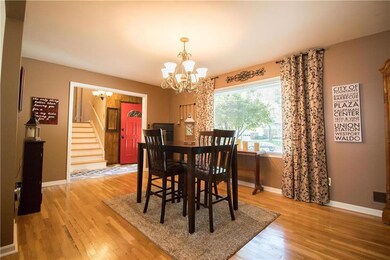 Living room used as a dining room.  Beautiful wood