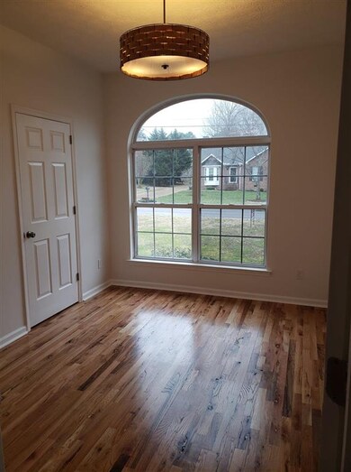 Bedroom with new flooring and paint