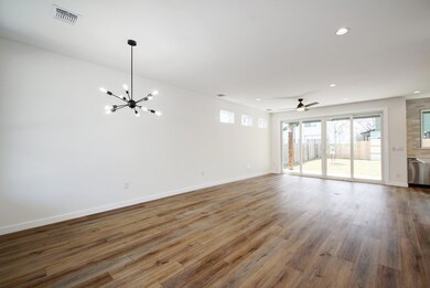 Unfurnished living room featuring recessed lighti