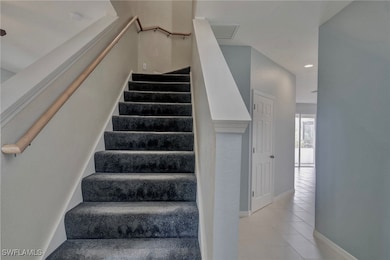 Entry with staircase leading to upper floor
