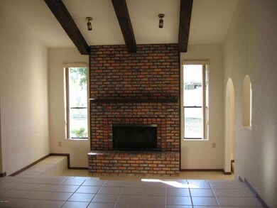 Sunken Seating Area Surrounds Hearth