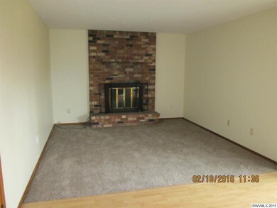 New carpeting with cozy fireplace and access to ba