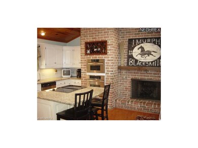 Special Kitchen with a Brick Fireplace
