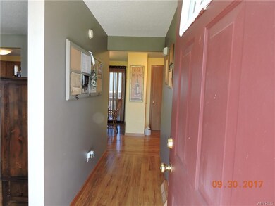 From front entrance to kitchen and family room