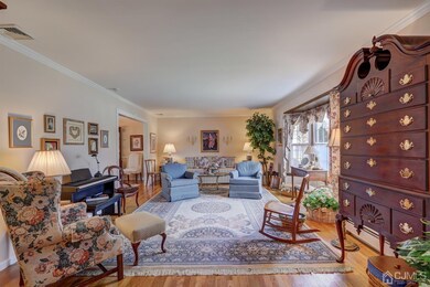 Living room is 13'.4' x 23'.3' with bay window and