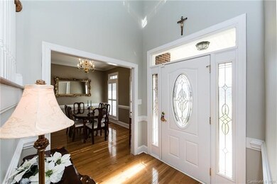Front entry foyer looking into formal dining room.