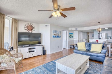 Living room with light wood-type flooring, ceiling