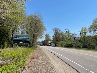 248 FEET OF FRONTAGE ON THE MAIN  ROUTE FROM SOUTH TO NORTH ON EATERN NEW HAMPSHIRE